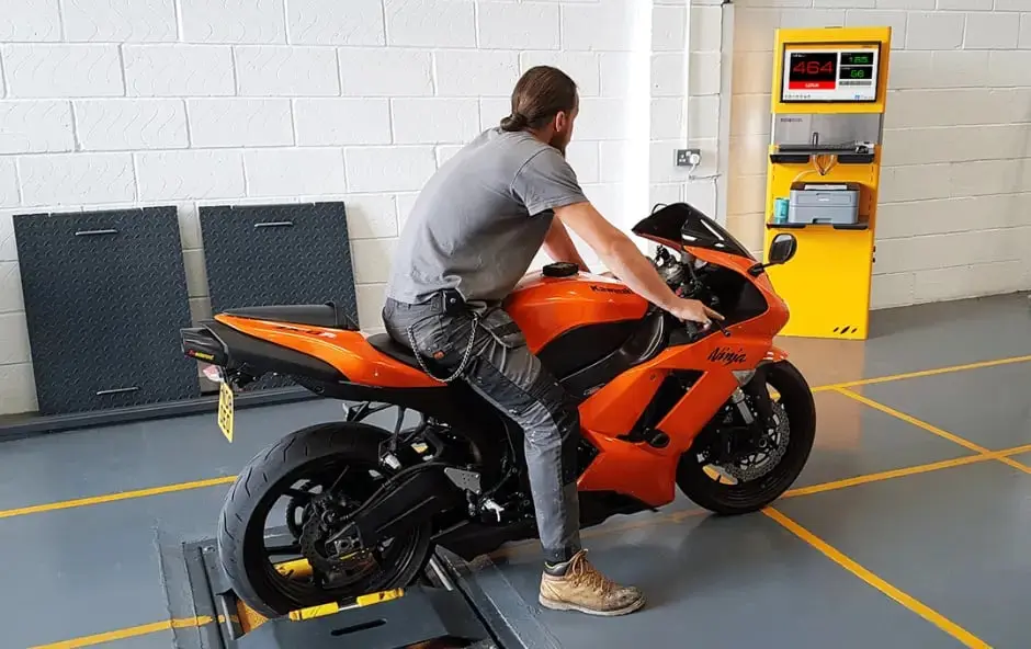 Boston Garage Equipment man on a motorbike