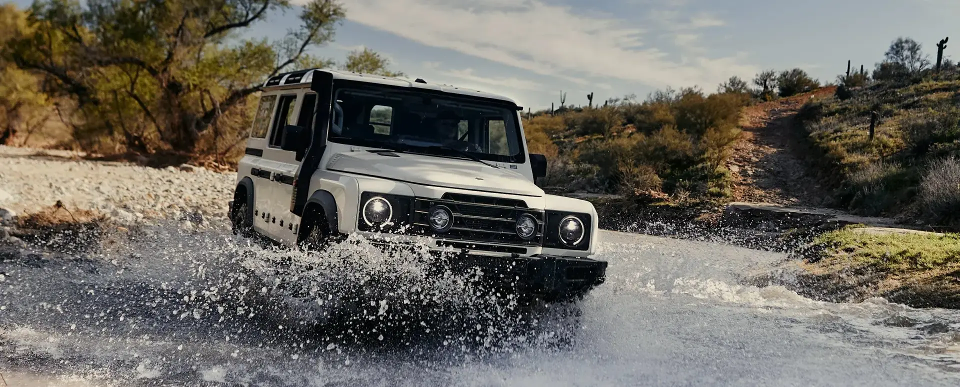 Ocean Group 4x4 driving in a river